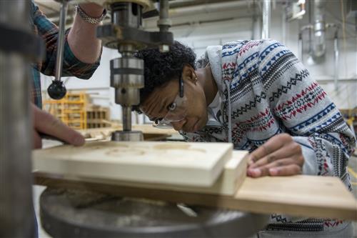 Student using machine 