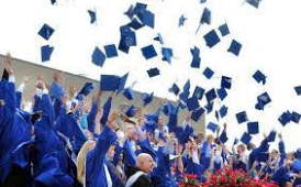  SILLOHUETTES THROWNING THEIR GRADUATION CAPS